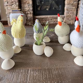 Hold my little knitted chickens great, also a cute little vase for artificial greens