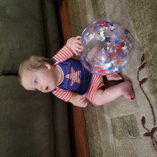 Perfect size ball for this baby boy!