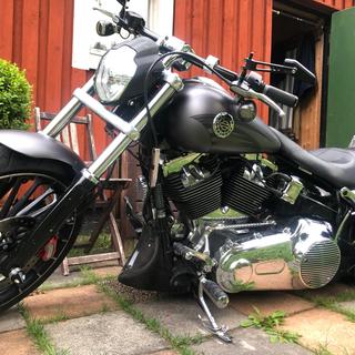 thumbnail image 2 of V-Twin Smooth Black Coil Cover For Harley-Davidson 2007-2017 FLST FXST – 42-0491 2 of 3