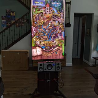 TV on with pinball.. can easily rotatevto tradional. This is at max height.. top is over 7ft.