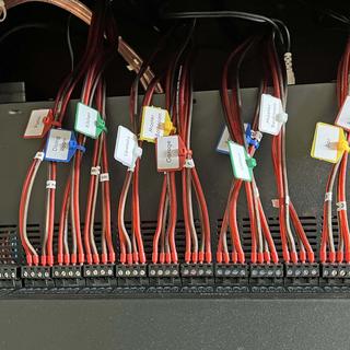 Wiring terminations for 1 amp and 12 zone whole house speaker system.
