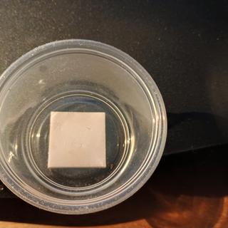 2 oz plastic cup, bottom view.