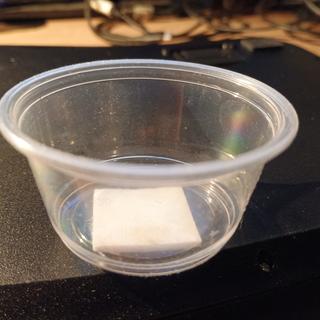 2 oz plastic cup, side view.