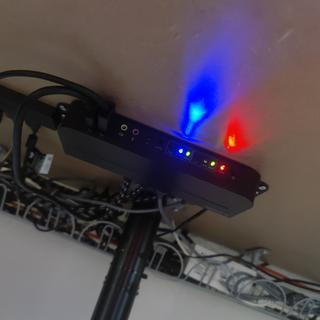 As seen mounted underneath the desk.