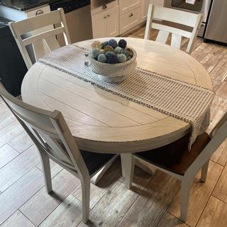 Raymour and flanigan round dining table sales