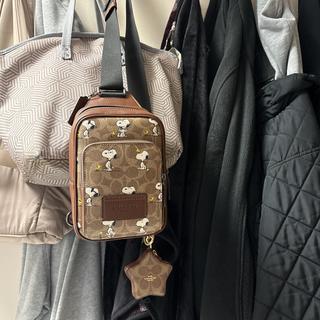 Coach X Peanuts Racer Sling Pack In Signature Canvas With Snoopy