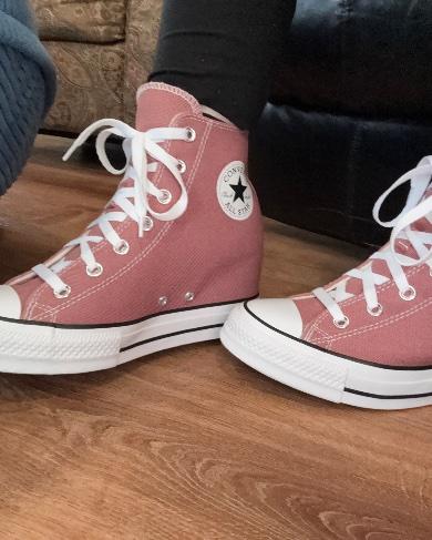 I bought both the light saddle color and the classic black converse wedges and I have absolutely nothing bad to say about them!! They’re so cuteeee VERY comfortable my new FAV everyday go too shoe. I do recommend sizing a half size down from your true size. I am a woman’s size 10 and I got a 9 1/2 for both pairs and I’m sooooo glad I did!!! They fit perfectly with just a little room to spare in case I needed to wear thicker socks with them. Dress them up or down you cannot go wrong with these wedges!! 👏🏻👏🏻 I will be coming back for the white and the red ones soon.