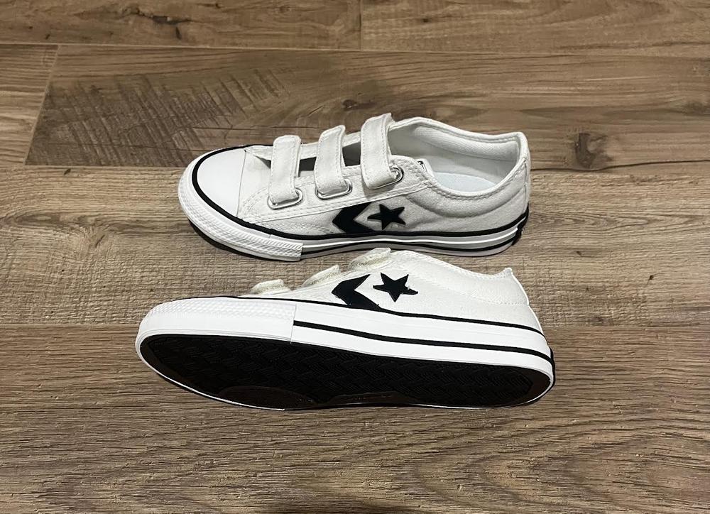 I have always been a huge fan of Converse shoes and own several pairs myself. I have tried buying some for my kids but they become a hassel when they don't know how to tie their shoes themselves. When I recieved these shoes, I was beyond excited. I absolutely loved the classic style, and the fact that my son can easily put them on himself! I love the black and white color combo because they match with anything. The only drawback with white canvas shoes, worn by a 6 year old boy, is that they get dirty quickly. Luckily, I was able to put the shoes in the washing machine and the shoes held up great and came out looking good as new! I will absolutely be buying another pair when my son grows out of these!