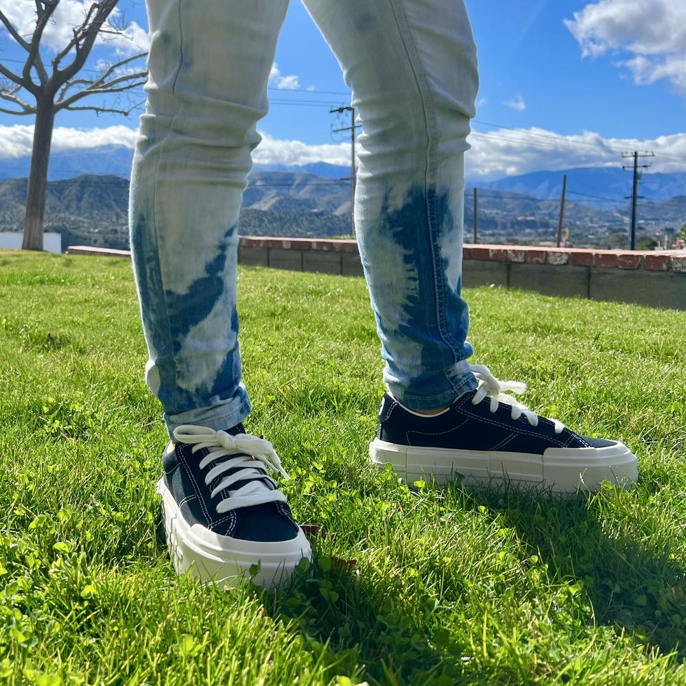My pre-teen daughter really likes her new CTAS Cruise All Black.  They look amazing on her, and the thick soles elevate her smile as well as her height. 

The black canvas fabric is perfect for resisting stains. The interior white finish is classy and makes slipping on the shoe so smooth. The shoes feel incredible in your hands. They are lightweight and the suede accents feel special and intentional.    

The Cruise shoe fits correctly in length, although the arch is a little tight on my daughter, but not too much to prevent her from wearing her new favorite shoes. I love seeing her confidence in her height and appearance, when wearing her new Chuck Taylor All Stars.