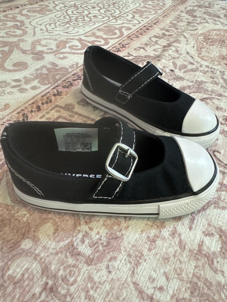 The Chuck Taylor All Star Dainty Mary Jane Shoes are the perfect little girl’s shoe to dress up, to wear for casual days, and are very lightweight and flexible. The quality of the shoes is like that of an adult Chuck Taylor shoe, just in miniature size. Our daughter likes to be independent and with these shoes she is able to easily slip on and secure the strap over her foot with an easy Velcro tab. The design is your class Mary Jane style with a mash up of the Chuck Taylor color and style, which we love. What I like most about the shoe is the comfort for all day wear for our little one and the ease of use. You won’t be disappointed with these cute and stylish shoes!