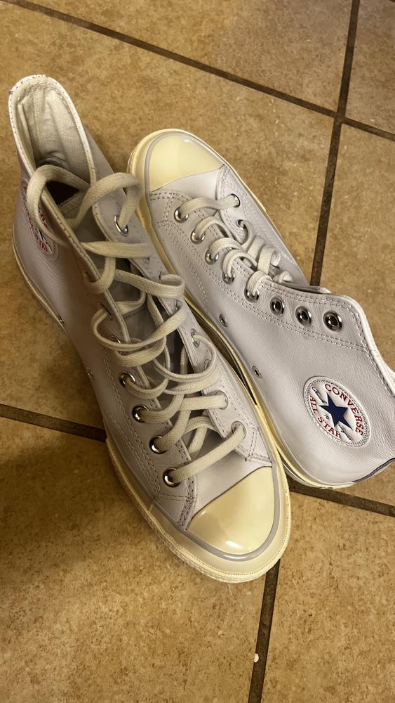 I received my Chuck 70 LEATHER Hi Egret & I’m in love! This versatile sneaker is unparalleled. Being a fashion-forward girl that always understands the importance of classic, timeless kicks is a must have in everyone closets.

The casual to semi casual sneakers pairs excellent  with jeans, skirts, and even favorite dresses. The first thing I notice is the converse vintage charm that is effortlessly classics the high-top style not only adds an extra layer of style but also provides ankle support while making these sneakers suitable to wear all day! 

The Chuck 70 LEATHER Hi Egret is a true testament to the appealing classic design in a way that many sneakers can’t be match!