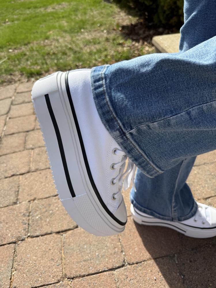 These chucks have some serious lift and I’m here for it. They are so insanely cute and slightly over the top in the best way. Wearing them you would never know they are platforms, they’re super comfortable and I feel really stable on them. The insole is soft and squishy yet supportive. I went with the white and they look so good with jeans. They seem really well made. I am between a 9.5 and 10 and went with 10. I’d say they’re true to size. There’s a little room but I think it’s the right size for me, I think any smaller would be too small. They tighten up well, too. Overall, I think these are awesome. Love that they’re comfortable while also being very stylish.