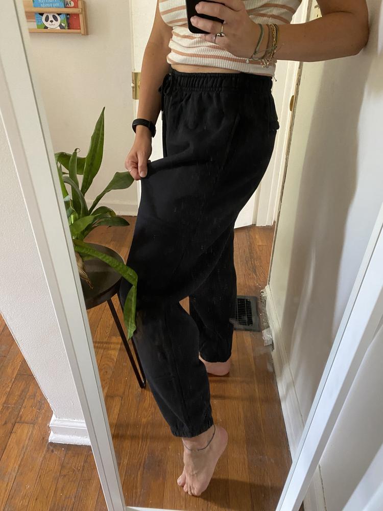 These are a great relaxed sweatpant for a day around the house. They are thick, comfortable and a very relaxed fit. They are a gender-free sizing, so I would keep that in mind when deciding which size is best. I personally prefer a style that is a little bit more fitted and usually purchase a medium in women’s clothing. I got the medium in this pant as well, but it was very loose/relaxed fit on me— much more than I would prefer, so I’d definitely size down if you want a more fitted pant.  

I love that it has both side pockets and a zippered pocket in the back. The drawstring helps me to get just the fit I want around the waist. The elastic on the ankles pull the bottom of the pant into a cinched style, but is still very loose, so it doesn’t hug the ankle like other sweatpant styles might. 

Overall it’s a great lounge pant I would wear around the home. I wouldn’t venture out of the house in a super relaxed sweatpant, but if that’s your thing these would do the trick!