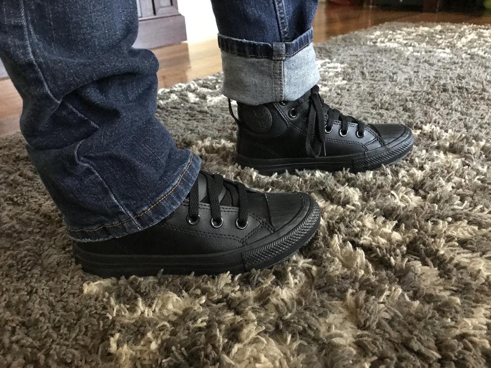 My son and I love his new Converse sneakers! They are very stylish and look really good on him! Black goes with well with so much, and these shoes are perfect for casual wear or even semi formal! 
He says they feel really good in his feet. He wore them for an afternoon at the park and had no complaints at all.
The tread on these shoes is fantastic. It has good grip and some bounce to it to help him stay sturdy on his feet and comfortable all day long.
I like how durable they feel and how easy they are to clean. They got pretty dusty and had some mud on them after our day at the park, but a wet cloth easily had these sneakers looking like new!
We are both really happy with these sneakers!! Love Converse!!