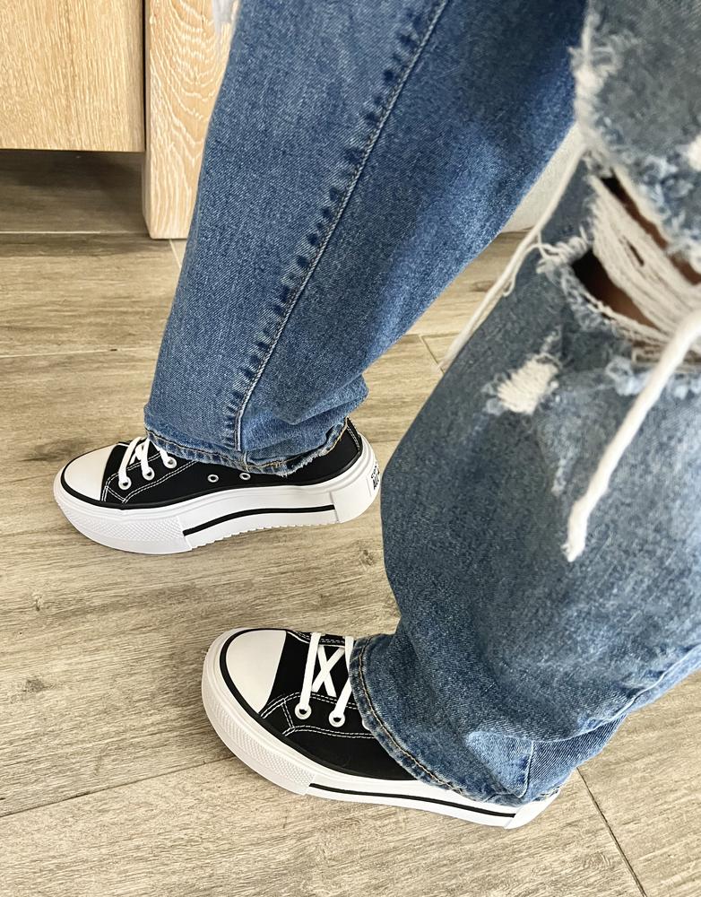 These Chuck Taylor All Star Lift Double Stack shoes are not only as stylish as the originals but they are incredibly comfortable! It almost feels like you are walking on a cloud. I wore these all day with no issues. I also love the extra cushion from the platform and the ankle support they give to my feet. I am normally a size 7.5 women’s and I got the size 6 men’s and they fit perfect! Chuck Taylor All Stars normally run a half size bigger so size down a half size. The design is great as usual and the fabric is soft and very comfy but also durable and stiff enough to support your foot. The double stack platform is tall but took no time to get used to and is still very lightweight and comfortable to walk in. I love the classic black canvas color, it’s so versatile and goes with everything; dresses, jeans, shorts, skirts, you name it. If you are looking for stylish yet comfortable shoes, these are for you. My new favorite go to shoe!