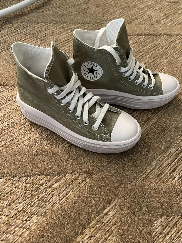 I love these converse! I have owned many converse over the years and these are by far the most well fitting and comfortable. They have a thicker sole but, in turn it feels like you are walking on a cloud, they are so comfortable! In terms of size I went for a 5.5 as they fit big a little but I always wear either 5.5 or 6 and these were perfect.

I got to design these shoes myself and I’m someone who loves a subtle shoe that can blend in with my outfits. So for me I chose an olive green shade. I kept the rest of the shoes with green and white features and the logo black and white! I love how they turned out. I can wear them with a lot of different styles. I can wear them all day everyday because they are so comfortable! I highly recommend making these shoes what’s true to you and you’ll love them! 

I’ve worn these a handful of times already and gotten compliments on them. I really enjoyed the aspect of designing my own shoe, and the classic design of the converse. I don’t think there’s