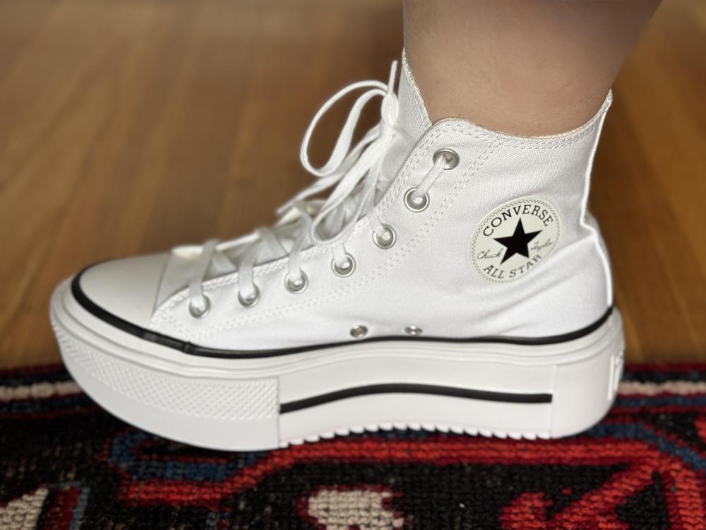 The Chuck Taylor All Star Lift Double Stack shoes are a stylish upgrade to the classic Chuck Taylor design. I love that I can have the classic Chucks look, with the added extra height that adds a fun touch to any outfit — from casual to dressed-up looks. 

Comfort is notably better than traditional Chucks thanks to the added cushioning in the thicker sole, providing more support for daily wear. If you have wider feet like myself, I’d suggest going up a half size. The sturdy canvas upper and durable rubber outsole offer great durability and grip. 

Overall, I’m super impressed! The Chuck Taylor All Star Lift Double Stack shoes combine style, comfort, and durability in a fun, elevated design. A must-have for anyone looking for a fresh take on the classic Chuck Taylor look.
