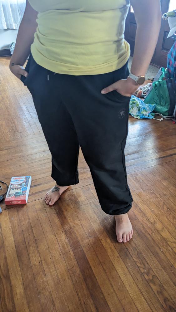 These sweats are *thick* in the best way. Definitely more for winter than a casual wear in mild weather, but I love them. The pockets are full-sized (including the zippered back one!) and feel very sturdy. The fact that they're 100% cotton really means it's moves with my body, which I am a fan of. I honestly don't have anything about these that I don't like. Buy them!