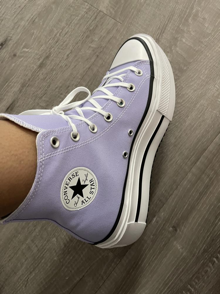 First off, the classic design on these Chuck Taylor All Star Lift Double Stack Shoes! Is timeless and versatile, making these sneakers easy to pair with a variety of outfits, from casual to slightly dressier looks. The color is gorgeous!! allowing for personal expression.
In terms of comfort, they feel like normal Converse. Initially, the stacked look made me nervous but they feel great. After a few wears, I found them to be more comfortable, but I wouldn’t recommend them for extended periods of heavy walking, as they are double stacked and a bit on the heavier side.
The fit is true to size for most, but it’s worth noting that people with wider feet might find them a bit snug. Overall, if you're looking for a stylish, casual sneaker for everyday wear, the Chuck Taylor All Star Lift Double Stack Shoes! are a excellent choice choice.