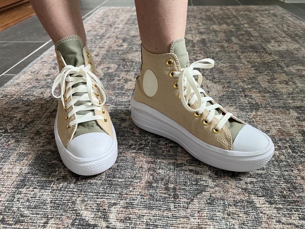 I absolutely love everything about these shoes! They look so cool and make any outfit immediately edgier. They look particularly good with joggers or dresses, and people always comment on them. The sole is really comfy and I could wear it all day because it’s lightweight, stable, and has good cushioning. I picked neutral colors so I could wear them with lots of outfits, and I love the gold hardware as a pop of personality. I also added my name in embroidery on the heels which is so fun. The shoe fits close to my foot, and I can wear with or without socks. If I could change one thing, I would add a thicker edge on the top of the tongue to make that area look more finished. I highly recommend personalizing your shoe with your favorite colors, because then you will always have the most unique shoes in the room! I’ve been wearing these in the spring and summer, and I expect they will also work well in the winter with colder temperatures. These are my favorite pair of sneakers by far!