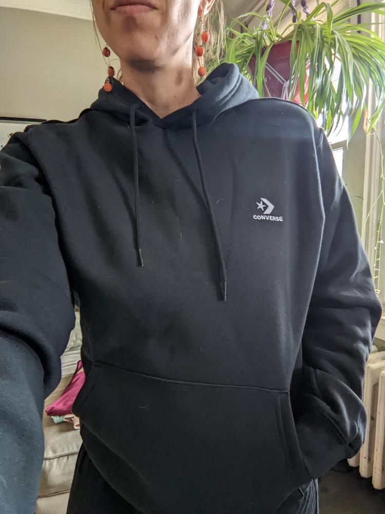 This hoodie is everything I look for when hunting down the best. The inside is so very soft, and the exterior doesn't hang onto to dog hair and dust like other fabrics with a similar feel tend to. Brand emblem is small and classic, therefore I don't feel like a walking advertisement! The sizing is considered "gender free", and I appreciate that inclusive language. I typically wear a  6/8, or medium, in femme sizing. I chose size small for this gender free sweatshirt and it fits well. Some room to layer, but not at all baggy. The shoulders hit in the right spot and it is long enough to sit just below my hips, to keep my middrift warm and cozy. The hood is big enough to sufficiently cover my head and not over take it.  I can't wait for the weather to cool down so I can't wear it all the time.
