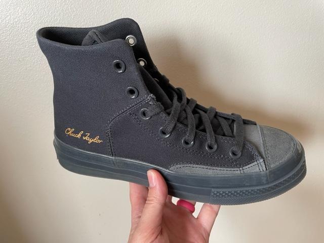 These Converse Chuck 70 Marquis hightops in nightfall grey/cyber grey look so good! I love the tone on tone with two different materials. Unfortuantely, these shoes run large, like at least a 1/2 size bigger than other sneakers. I was able to wear them and while comfortable - the cushioned insole is dreamy - they were a bit too big to be practical for long wear. The quality is great and I would highly recommend the shoe, just be prepared to size down. I will say that having the brand on the inside of the shoe does throw me a bit. I like the sleekness of the simple print on the outside, but it almost feels like they were made wrong with the Converse star/cirle on the inside of the foot. Otherwise, great looking/feeling shoe overall.