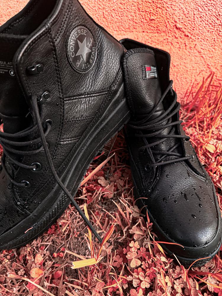At first glance, these look much larger than they are and a little like they have platform soles. They are also heavier than the typical Converse. The leather is soft and appears to be of good quality. They fit true to size and only feel slightly heavier when walking. The ankle is a little stiff but honestly it came in handy when walking on wet/slippery surfaces. They’re so well insulated and protected from the elements. In spite of constant downpour, they didn’t feel wet or cold inside. I can’t wait to test these out in the snow this winter!