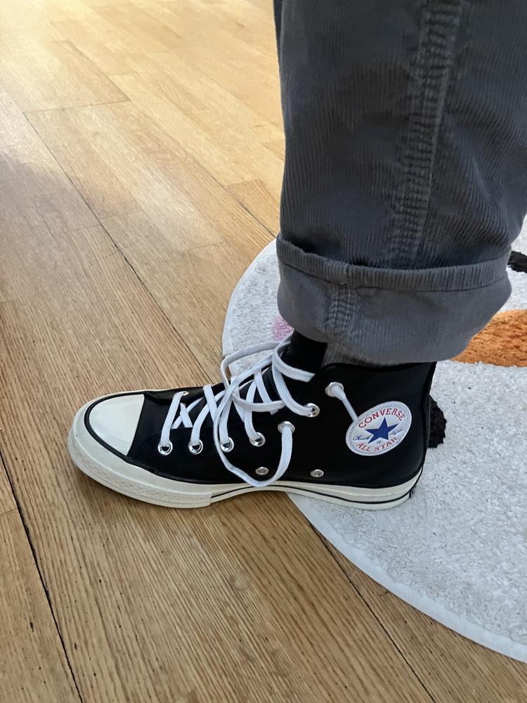 These shoes are outstanding! I am impressed with the fit and feel of these shoes. The leather is beautiful and the black goes with everything. Will definitely purchase again in the future! Most Converse run a little big, but I find these to be true to size.