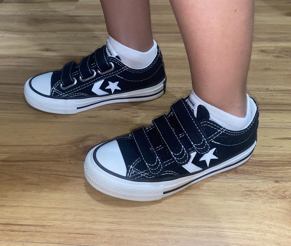 Out of the box, these shoes look sharp and fresh. My 6 year old oooh-ed  and ahhh-ed at these right away, which is not typical for anything simply black and white. She loves vibrant colors, but simple goes with so much more!! Mom loves the fact that these are VELCRO, and low tops, which makes putting them on independently a breeze for small kids. Kid loves how comfortable, sturdy, and stylish they are - she wanted to run all day in the once she got them on, and chose to leave them on after returning home, which is also not typical. These shoes get 5 stars from our family, and the star logos were also a kid favorite! Anything comfortable, easy to use, and durable is what we are after, and these new Converse certainly delivered!