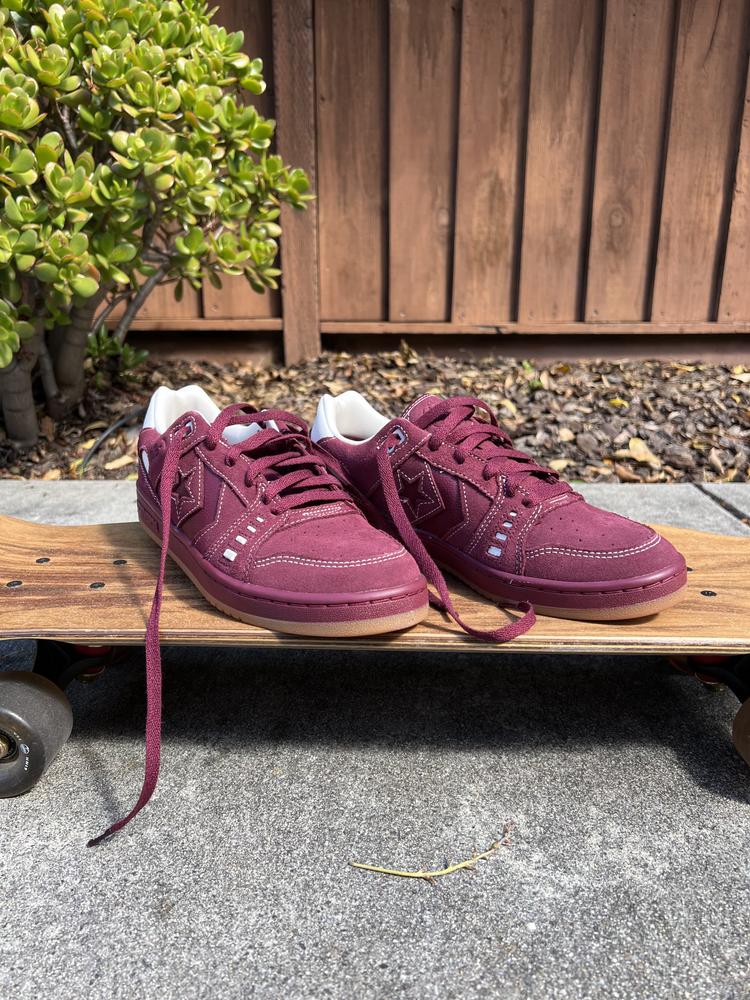 I recently got a new skateboard to cruise on and wanted some durable but stylish shoes to skate on. The Converse All Star Pro Ox in Red Suede filled the bill perfectly. The fit was great. I have wide feet and had no issues getting in there and being comfortable as I rolled around. 

I found the soles to be cushy but not overly soft. It was actually a good balance of cushion but providing a stable platform to kick and keep balance.  

From a style perspective the material is high quality and a beautiful deep burgundy color. They came w two sets of laces. I chose the white one. This is one thing that I think could be improved. The white laces seem to be of lesser quality than the red ones. I wish they were the same material. 

Overall I found these shoes to be very comfortable and look really cool. I got a lot of compliments from my friends and a few random strangers too.