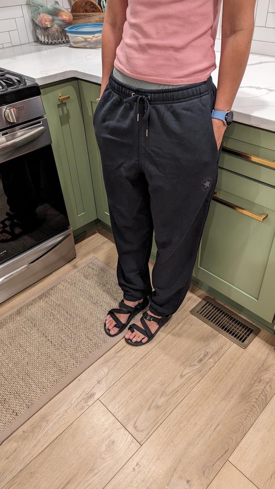 These oversized sweats are awesome. They are baggy, so keep that in mind when ordering (I'm 5'8' and slim in the picture wearing size M). They are super comfy and the fabric is thick, heavy, and cozy. I like that it has a back pocket, especially a zippered one! All of the details are great, with elastic ankles and metal capped drawstrings. These are great for wearing around the house, but premium enough that I wouldn't feel out of place wearing them around town. I would definitely recommend these.
