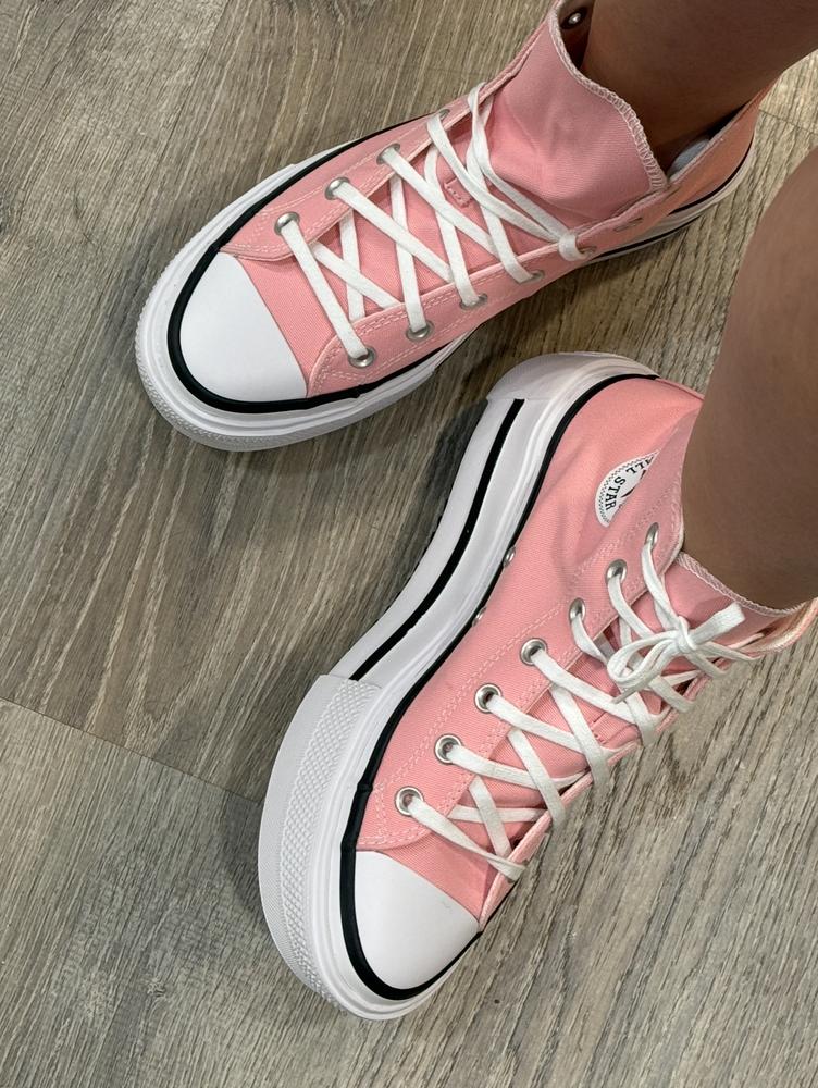 First, let me start by saying how comfortable these are! I was so shocked at how truly comfortable they are! Usually this style of shoe isn’t always the softest or padded enough but the memory foam insole is spot on! Plus, the high rise is just *chefs kiss*! I’ve always been a fan of the chunky or platform tennis/canvas style shoe!
They are a bit wide for my foot, so my foot tends to slide around in the shoe a bit which I do not like, but not enough to not wear them. They also run a bit big overall with sizing. I would have preferred a half size smaller. 
The pink color is a perfect bubblegum pink and and the material is as expected for a canvas shoe and if good quality.