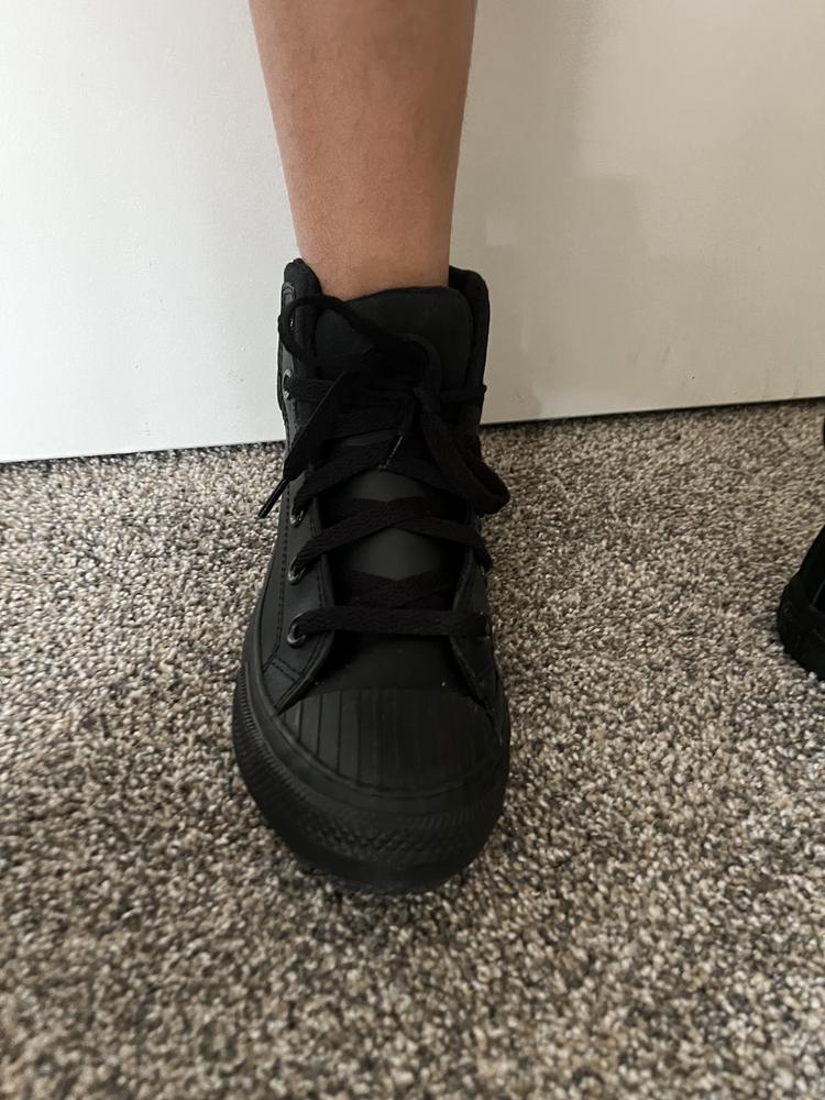 It’s a good shoe made out of quality materials. I love the fact that the shoe is all black so it matches everything. My kids are ruff on shoes and so far they have held up well. My son is able to wear them all day at school without his feet hurting due to a comfortable insert. The sole makes them be non slip and they are perfect to wear in different terrains. Can be worn with pants or shorts. Will definitely recommend.