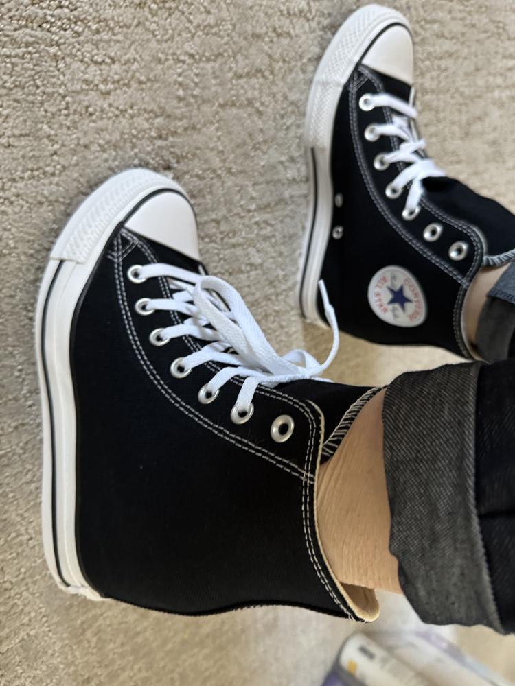 I love these wedge converse! I’m usually a size 8, but the 7.5 fits perfect. My feet are wide so the fact that 7.5 fits is a win for me. In these photos I am wearing a thinner style sock. I think you can get away with a thicker sock.
I have a wider foot so I wasn’t sure how they would look on me, but the shoe holds my foot well and the wedge is not too tall or too short.
I was thinking the weight of the shoe would be somewhat heavy, but they are not. They are very easy to walk around in.
I like how you can tie the shoes tradition way and have the ties showing and not and the style is cute(see photo).
I think these would be cute in every color! Black is definitely and staple, but would be cute in pink/red/yellow.
I recommend these 100%