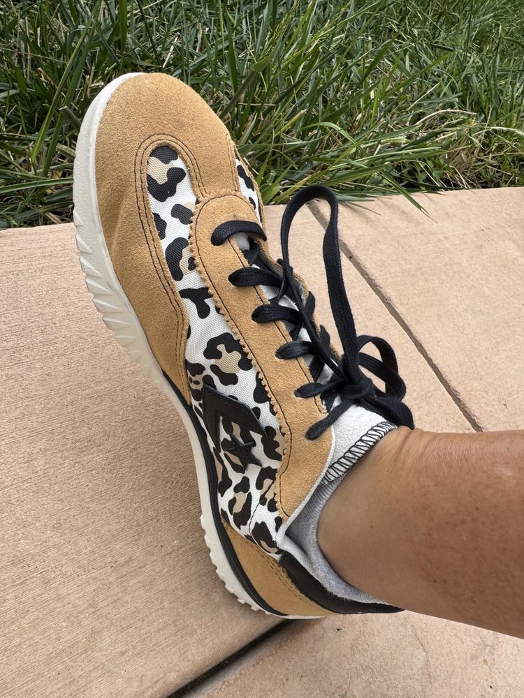 Ohhhhmgeeee these Converse are fire! The easy online interface allowed me to design the shoes exactly to my specifications. There were so many options and colors to choose from. I tinkered with many possibilities— floral or zebra or leopard print— I settled on leopard with white soles, beige trim and black laces. They are SO adorable! I get tons of compliments on them. They fit perfectly true to size and are super comfortable. The suede trim and galvanized soles are robust but the overall feel is light. I’ve sent a few friends to the site to design their own. Very fun and affordable way to spice up my footwear!