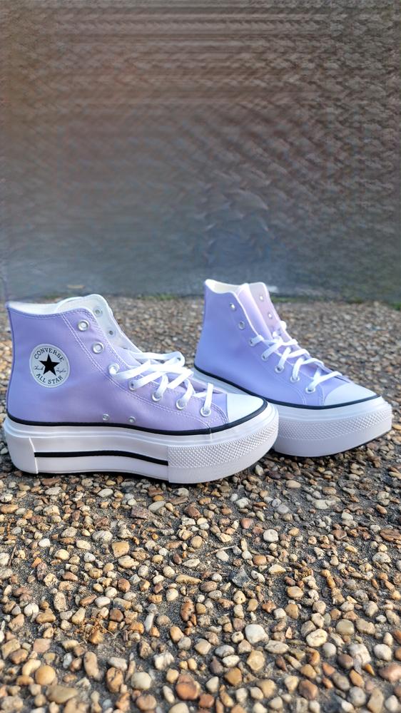 The Chuck Taylor All Star Lift Double Stack shoes exhibit a unique charm. These unisex shoes offer an additional two inches of height. It appears that they are designed for narrower feet rather than wider ones. Walking in them is relatively comfortable due to their excellent cushioning. As a platform-style shoe, it may take some time to get accustomed. I strongly recommend the All Star Lift Double Stack shoes for those looking for a distinctive, comfortable, and stylish option. In my opinion, teenagers would undoubtedly adore this shoe.