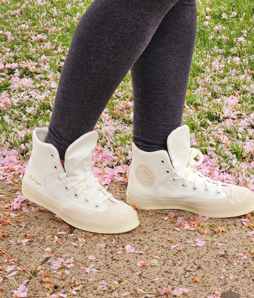 These chucks look super stylish right out of the box.  The white/natural color combo looks amazing and is pairs well with almost anything outfit.  The classy gold accent and suede additions are the perfect inclusions. In addition to style, I was seriously impressed by the comfort. The inside was lightly padded which kept my feet cool and cushioned. I was worried about the shoe rubbing near the back of my foot/ankle but my feet were completely comfortable for hours. The insoles were also lightly cushioned for comfort. The shoe does seem to run slightly big but overall great shoe!