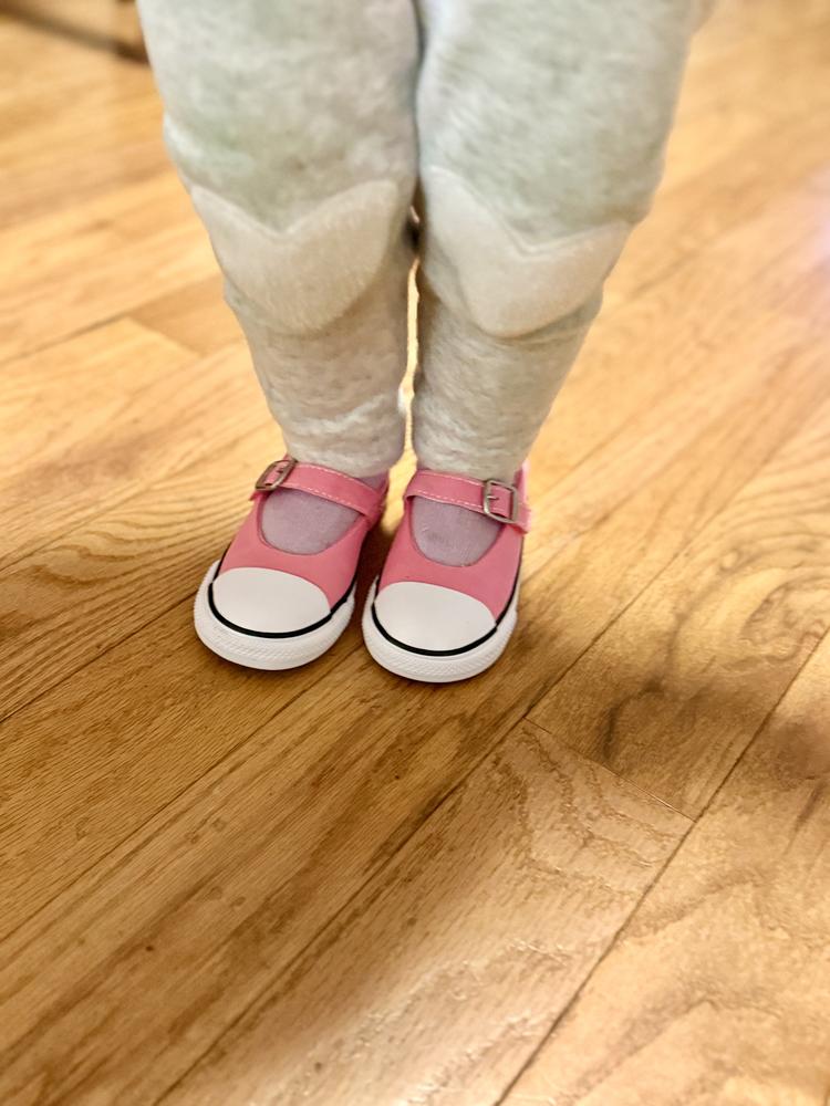These shoes are the absolute cutest!! The design is great because the strap helps keep them on her feet and the quality is amazing! They are the quality you would expect in an adult shoe, but a miniature version! The color is the perfect pink and they seem to be very comfortable for my little one! She instantly fell in the love them and immediately started running everywhere. The fabric is amazing and I’m definitely going to spray these with a protectant to help keep them clean and waterproof. I also think the fabric will hold up really well in the washer and dryer should I need to clean them down the road! So cute! Now I need matching ones!
