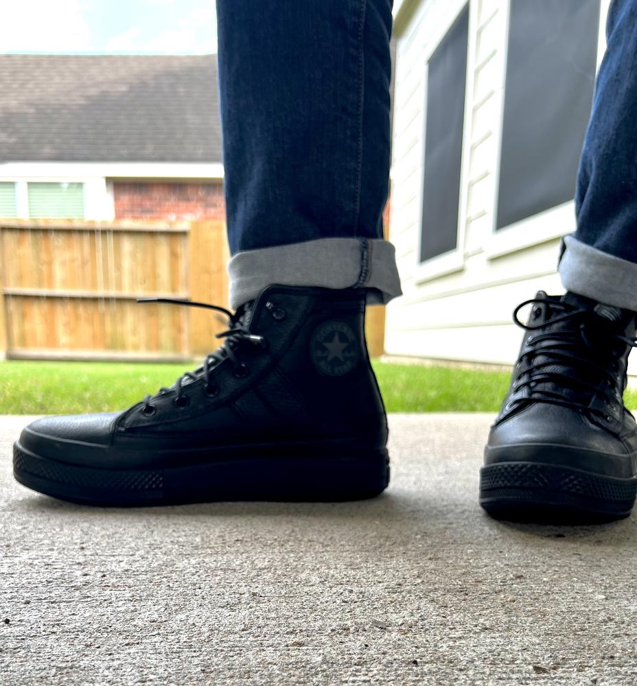 These Chuck Taylor All Star Equip Waterproof look really good with jeans. The black on black is really sleek and has a modern look about it. They are the perfect colder-weather or winter shoe since they are waterproof and have a high rise to keep you warmer. The fabric is thick and I know these shoes will last a long time. The only thing I did not like is that they are a little bulky. The shoes are really comfortable and once I wear them for a longer time, the heaviness wears off and they feel fine. It does have a platform of about an inch high.