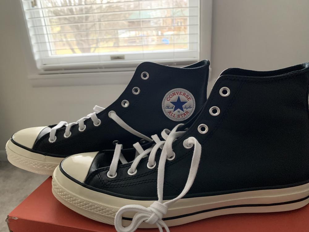 The Chuck 70 LEATHER HiTops are a luxe take on the traditional chuck we have all grown up with. The fit and style is essentially unchanged since my first pair in fifth grade, but the addition of a leather upper adds a more grown up feel to these HiTops.
The interior of the shoe is canvas lined so you don’t have to worry about the leather rubbing and causing blisters which was nice. If you are looking for a supportive shoe however, this is not the shoe for you. But if you want to look fresh while out and about, these are definitely a good option.
