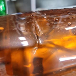 Creased after turning bottle that was full of cleaning solution upside down.