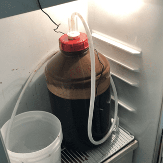 Fit a 3/8 tygon tube to the bubbler and placed it in sterilizer solution.  And cleaned up the mess