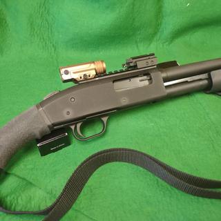 Mossberg 590 Shockwave Laser 20 Gauge 3in Saddle Black Pump Action